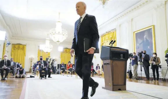  ?? (Photo: AP) ?? President Joe Biden leaves after speaking at a news conference in the East Room of the White House in Washington, DC, yesterday.