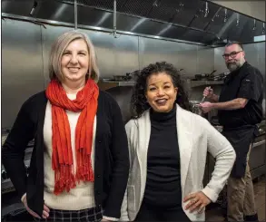  ?? (Arkansas Democrat-Gazette/Cary Jenkins) ?? Shannon Collier-Tenison and Danyelle Walker, co-chairwomen of Soup Sunday, are in the kitchen of Allsop & Chapple restaurant with featured chef James Hale, who was making a tomato bisque soup. More than 30 restaurant­s will be on hand providing soup samples, bread and desserts.