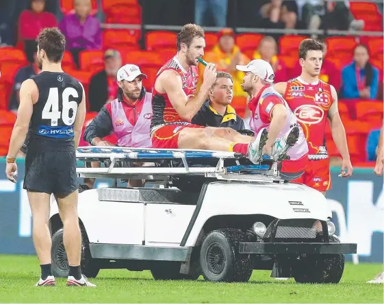  ?? Picture: GETTY IMAGES ?? Michael Barlow will have plenty of support from his Suns teammates after a horror injury that has ended his season.