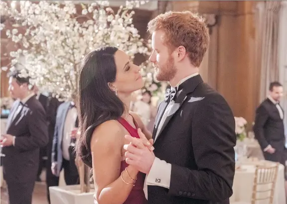  ?? PHOTOS: CORUS ENTERTAINM­ENT ?? Parisa Fitz-Henley stars as Meghan Markle and Murray Fraser is Prince Harry in Harry & Meghan: A Royal Romance, which features the couple’s courtship.