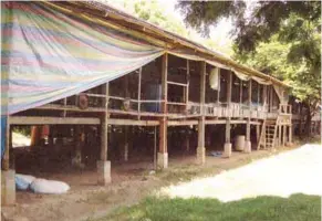  ??  ?? Fig. 2. Curtains to protect poultry and swine houses or pens during the wet season.