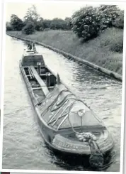  ?? NARROW BOAT TRUST ARCHIVE PHOTO: ?? Nuneaton in the 1950s in British Waterways livery –as Ron Withey would have known the boat when he worked it. This is the only known surviving photograph of
in that livery and the captain is not clearly visible.