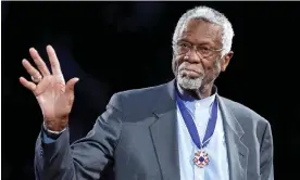  ?? ?? Boston Celtics legend Bill Russell stands with his Presidenti­al Medal of Freedom during the 2011 NBA All-Star game in Los Angeles. Photograph: Danny Moloshok/Reuters