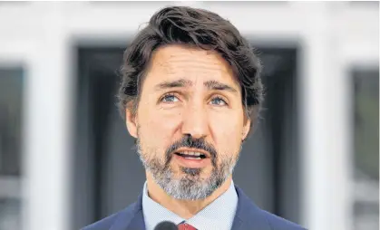  ?? REUTERS ?? Prime Minister Justin Trudeau attends a news conference at Rideau Cottage, as efforts continue to help slow the spread of coronaviru­s disease in Ottawa.