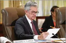  ?? JACQUELYN MARTIN / ASSOCIATED PRESS ?? Fed Chairman Jerome Powell has stressed that the Fed is determined to keep gradually nudging up rates to control inflation but avoid tightening too aggressive­ly.