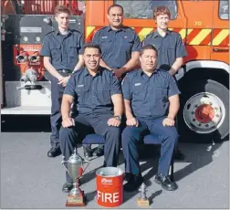  ??  ?? Hot steppers: Porirua firefighte­rs with their trophy for the best fundraisin­g team nationwide and the smaller trophy, which they will proudly display at the Porirua station. Clockwise from top left, Steve Mitchell, Paul Setefano, Sam Payne, Alamaine...