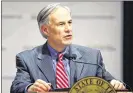  ?? JOEL MARTINEZ / ASSOCIATED PRESS ?? Texas Gov. Greg Abbott said almost 10,000 immigrant families and unaccompan­ied children were detained across the border in August.