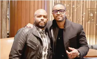  ?? JERMAINE NOLEN/SUN-TIMES ?? Chicago natives Lahmard and Larenz Tate pose during a recent hometown visit.