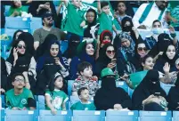  ?? (Faisal Al Nasser/Reuters) ?? WOMEN ATTEND a rally at the King Fahd National Stadium in Riyadh yesterday to celebrate the country’s National Day.