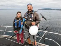  ?? ERIC GUTH ?? For the past 14 years, marine biologists Holly Fearnbach and John Durban, who are married, have used drone technology to study southern resident killer whales in the Salish Sea between Washington State and British Columbia.