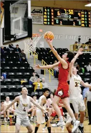  ?? ENTERPRISE-LEADER photograph by Mark Humphrey ?? Blackhawk senior Wes Wales spins left and scores going to the basket after posting up during a conference game won by the Blackhawks, 56-39, at Prairie Grove’s Tiger Arena in a reschedule­d game played Monday, Jan. 13.