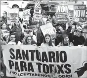  ?? ASSOCIATED PRESS ?? SOME OF ABOUT 100 people demonstrat­e outside a federal immigratio­n court in Los Angeles March 6, protesting the arrest of an immigrant who has been ordered deported.