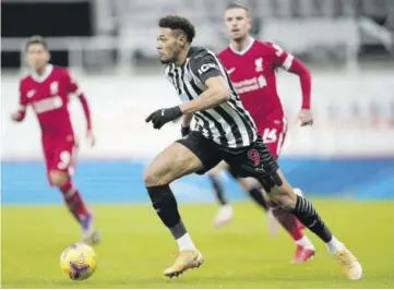  ?? (Photo: AFP) ?? Newcastle United’s Brazilian striker Joelinton dribbles the ball during the English Premier League match against Liverpool at St James’ Park in Newcastle-upon-tyne, north-east England, yesterday.