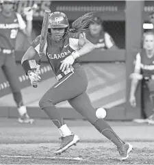  ?? SARAH PHIPPS/THE OKLAHOMAN ?? OU's Rylie Boone bunts in the third inning against Florida State in Game 2 of the WCWS championsh­ip series on June 8 at USA Softball Hall of Fame Stadium.