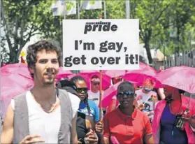  ?? Photo: Simphiwe Nkwali/Gallo/Sunday Times ?? Fightback: Hundreds of people gather for Jo’burg Pride, the oldest queer event on the continent.