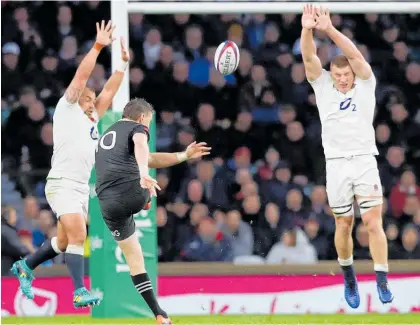  ?? Photo / AP ?? Beauden Barrett fires over his first test match dropped goal.