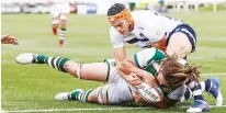  ??  ?? Cap that: Jordy Reid lands Trailfinde­r’s fifth try