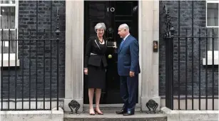  ?? (Toby Melville/Reuters) ?? PRIME MINISTER Benjamin Netanyahu is welcomed by British Prime Minister Theresa May outside 10 Downing Street yesterday.