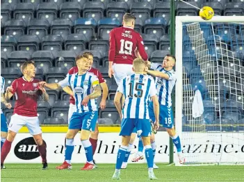  ?? ?? Anton Dowds outjumps the Killie defence to head the winner five minutes from time