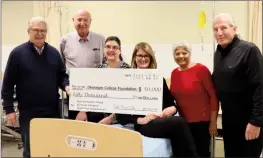  ?? Special to The Herald ?? Yasmin and Rick Thorpe and the Penny Lane Legacy Fund presenting a $50,000 cheque to Okanagan College. Pictured from left: Bruce Hallquist and Orv Robson from the Penny Lane Legacy Fund; Alison Gibson and Helen Jackman from Okanagan College; and Yasmin John Thorpe and Rick Thorpe.