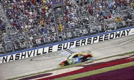  ?? Jared C. Tilton, Getty Images ?? Kyle Busch wins the NASCAR Xfinity Tennessee Lottery 250 at Nashville Superspeed­way on Saturday.