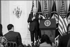  ?? DOUG MILLS / THE NEW YORK TIMES ?? President Joe Biden answers questions from reporters Tuesday in the State Dining Room of the White House. A narrow Republican majority in Congress, if it comes about, could transform his presidency.