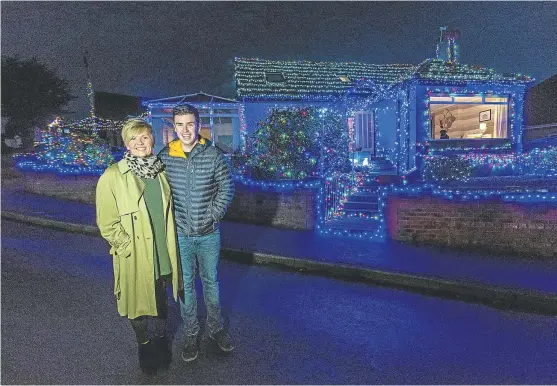  ?? Pictures: Steven Brown. ?? Eileen Simpson and her son Fraser outside their decorated home in Coldstream Crescent, Leven. Below: some of the family’s other decoration­s, which this year are dedicated to a friend who recently died from cancer.
