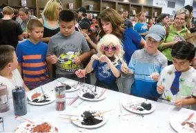  ?? RECORDER PHOTO BY CHIEKO HARA ?? Young witches and wizards customize their wands Tuesday, July 31 at the Portervill­e Public Library. The library held an event for the first time to celebrate Harry Potter’s birthday.