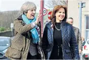  ??  ?? Theresa May visits Copeland constituen­cy yesterday to celebrate with new MP Trudy Harrison after the Tories’ by-election victory