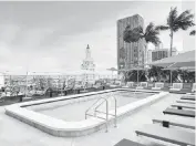  ?? CitizenM Miami Worldcente­r ?? The citizenM Miami Worldcente­r rooftop pool and deck overlook the Freedom Tower.