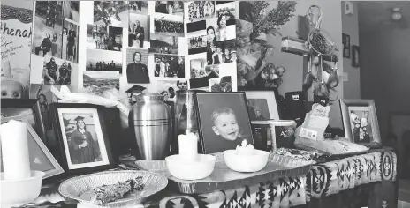  ?? MATT OLSON ?? A shrine created in memory of Brennan Ahenakew with items and images from family and friends is displayed alongside the urn containing his ashes at his home on the Ahtahkakoo­p First Nation.