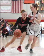  ?? BRAD DREY — SPECIAL TO THE READING EAGLE ?? Reading High’s Kya Washington, who finished with 18 points, drives against Schuylkill Valley’s Jadyn HeckHoppes during the Red Knights’ victory.