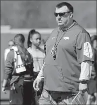  ?? NWA Democrat-Gazette/ANDY SHUPE ?? Arkansas Coach Bret Bielema said his team was excited for its first spring practice in pads. “Today has been something that they hang their hat on, and you get out there — whether you’re playing wideout, corner or nose guard or offensive center —...