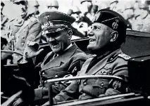  ?? PHOTO: GETTY IMAGES ?? Benito Mussolini shares a joke with Adolf Hitler during a visit to Florence in 1938. Italy has long harboured ambivalent feelings about its fascist leader, and politician­s have increasing­ly been citing him as a role model.