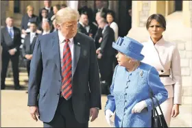  ?? AP/CHRIS JACKSON ?? Britain’s Queen Elizabeth II, right, President of the United States, Donald Trump and first lady Melania walk from the Quadrangle Friday during the president’s visit to Windsor Castle in Windsor, England.