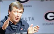  ??  ?? Georgia coach Kirby Smart speaks during an NCAA college football news conference in Athens. Georgia fully expects to contend for a national championsh­ip. Now, the Bulldogs have to show they can finish the job after coming tantalizin­gly close the last two seasons.