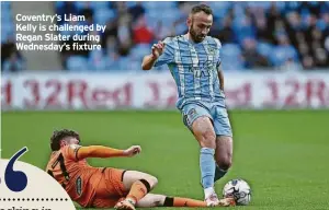  ?? ?? Coventry’s Liam Kelly is challenged by Regan Slater during Wednesday’s fixture