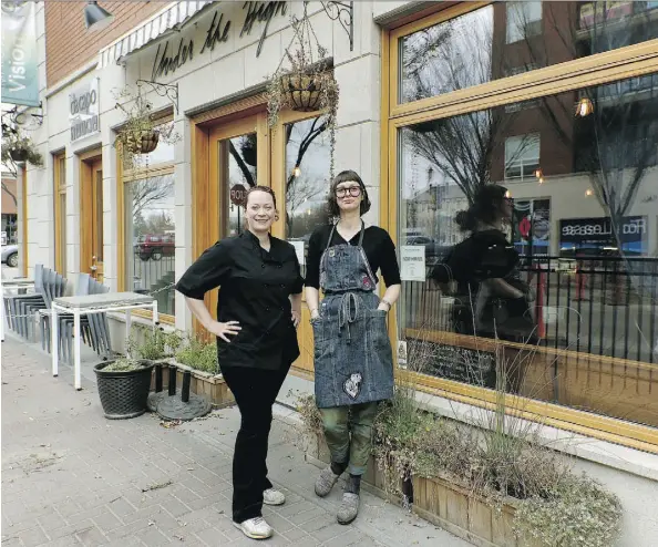  ?? LARRY WONG/EDMONTON JOURNAL ?? Jennifer Ogle, left, and Ada Kalinowski are co-owners of Under the High Wheel, the Journal’s choice for favourite in the category of Made for Mother’s Day. The restaurant is located in the Roots on Whyte building near Old Strathcona.