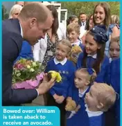  ??  ?? Bowed over: William is taken aback to receive an avocado.