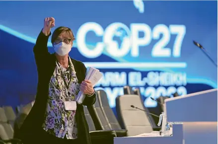  ?? AP ?? A woman gestures as a closing plenary session begins at the COP27 UN Climate Summit in Sharm el-Sheikh, Egypt.