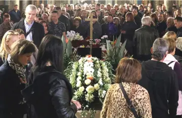  ??  ?? People attend the funeral service of killed Bulgarian journalist Viktoria Marinova in Holy Trinity Cathedral in Ruse, Bulgaria. —AFP photo