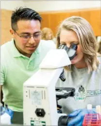  ??  ?? Left: Students at the University of Arkansas at Monticello get hands-on experience in the classroom. students a chance to enjoy the full college lifestyle.