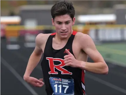  ?? DAVID DALTON — FOR THE MACOMB DAILY ?? Home field advantage? Zander Cobb of Romeo finished first at the Division 1pre-regional cross country meet hosted by Romeo Tuesday.
