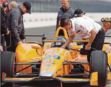  ?? AP PIC ?? Fernando Alonso prepares to drive for the first time at the Indianapol­is Motor Speedway on Wednesday.