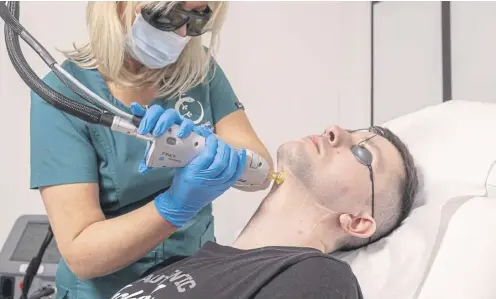  ?? ?? ↑ The firm says it is on track to become Scotland’s largest facility offering ‘life-changing’ fully ablative laser resurfacin­g within five years