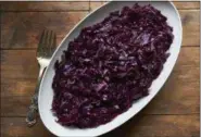  ?? MIA VIA AP ?? This January 2017 photo shows spicy braised radicchio and red cabbage with citrus in New York. This dish is from a recipe by Katie Workman.