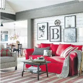  ?? BARN PHOTOS (2): COURTESY OF POTTERY ?? Colour palettes for fall home decor are trending toward more metallics and unusual shades, but a splash of primary colour still manages to perk up a room like this. Add a knitted throw and some cosy cushions to the brightly coloured couch and it...
