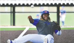  ?? DOUGLAS DEFELICE/ USA TODAY SPORTS FILES ?? Vladimir Guerrero Jr. isn't sitting down on the job this off-season. He's playing winter-league ball in the Dominican Republic in a bid to win back the job at third base with the Jays.