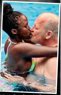  ?? ?? Intimate: Simon Danczuk embraces beauty therapist Claudine Uwamahoro