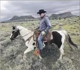  ?? Scott G. Winterton Deseret News ?? INTERIOR Secretary Ryan Zinke surveys the new Bears Ears National Monument in Utah.